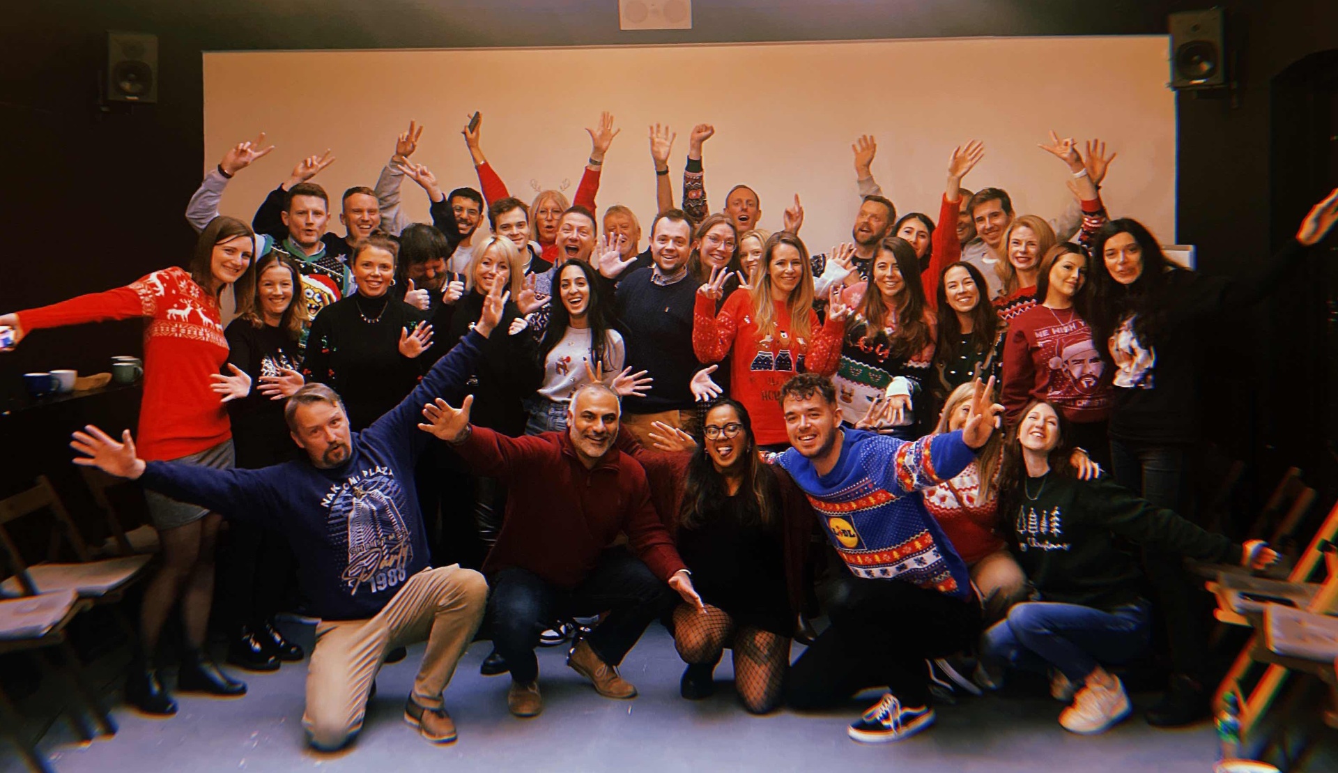 The Happiness Index team celebrating together in 2024