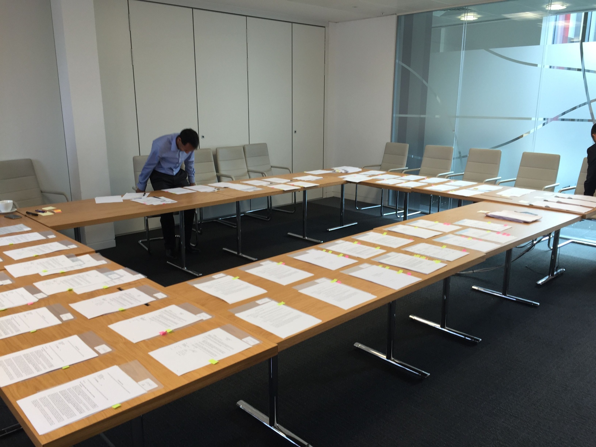 Chris signing the 4Ps Marketing acquisition papers in 2016